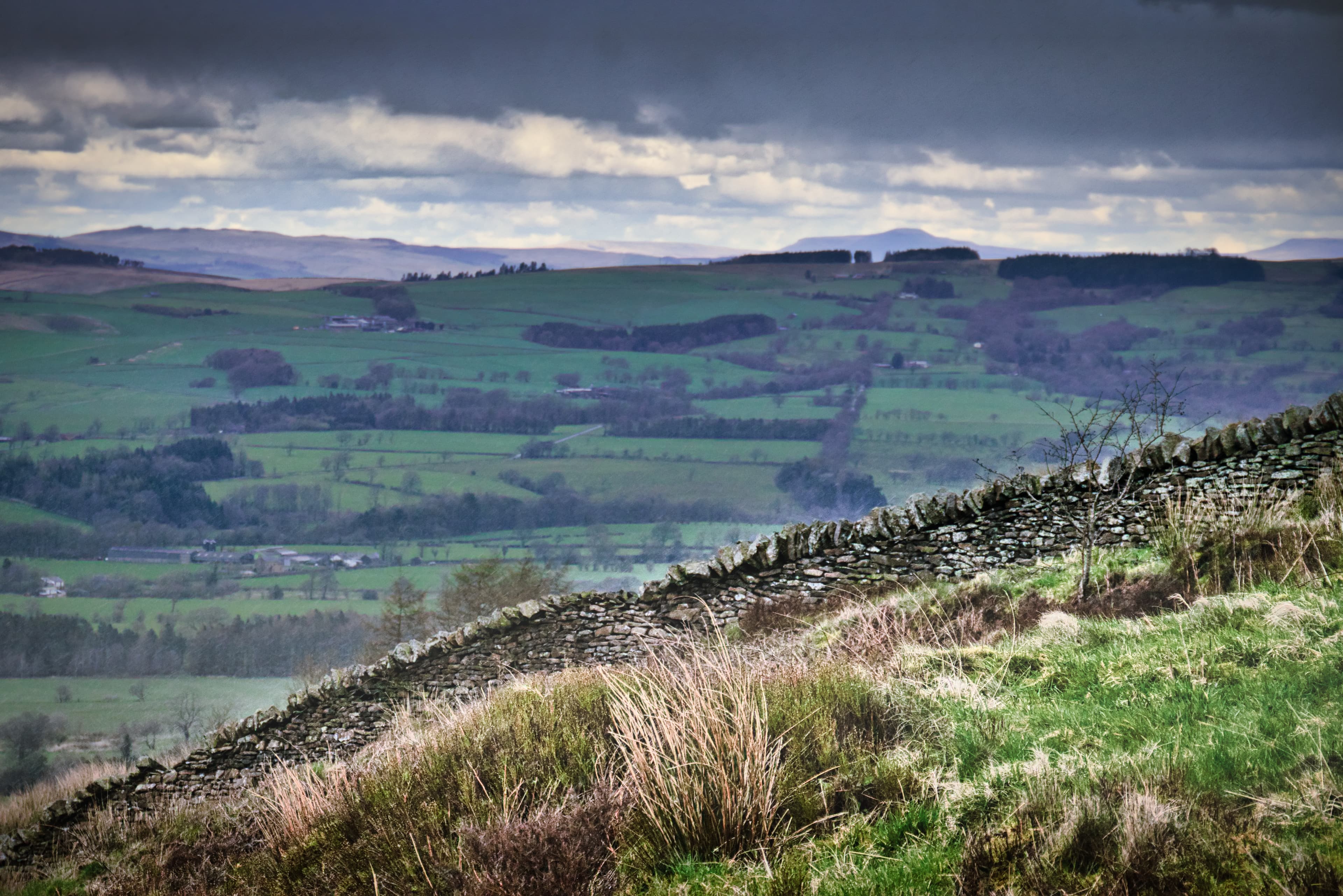 Stone wall and wide hills.