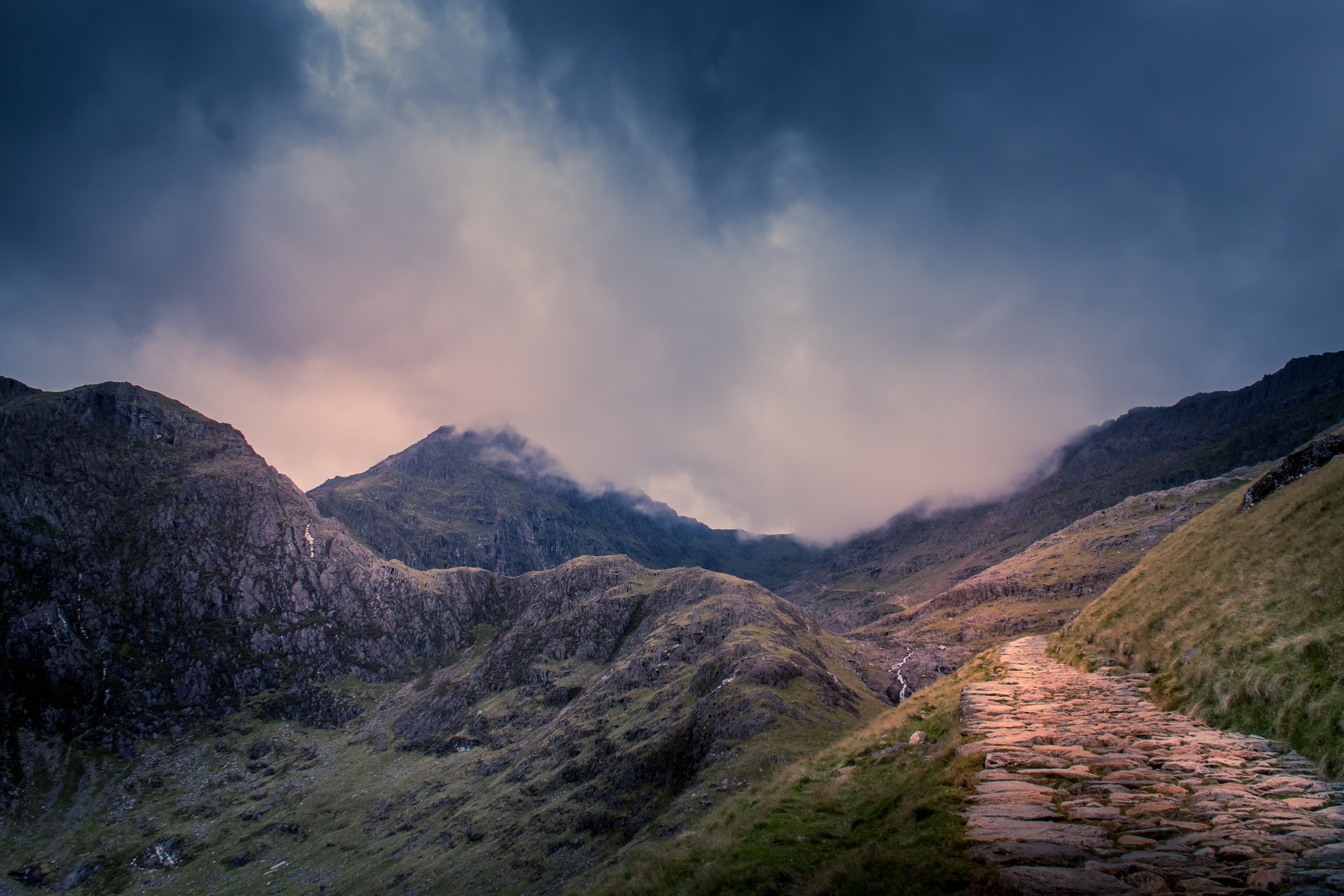 Clouds stacking over the hills.